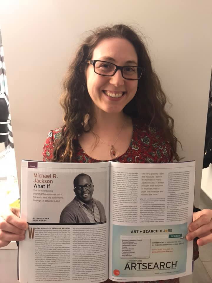 A photo of me holding my article in American Theatre Magazine
